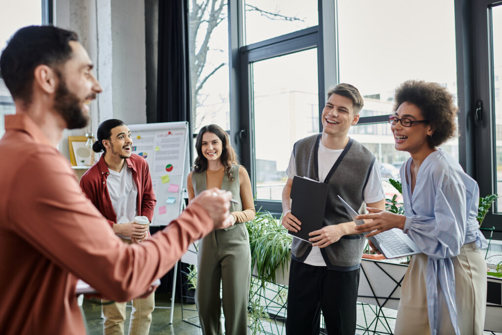 Sales executives sharing techniques for a sales pitch
